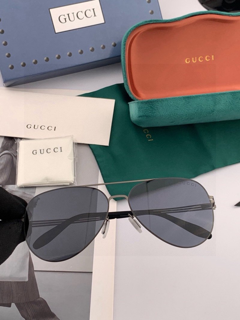 Солнцезащитные очки в металлической оправе Gucci