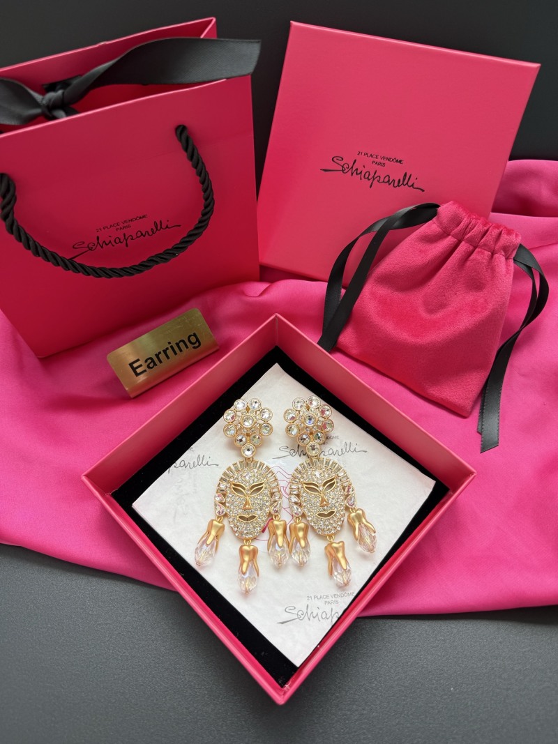 Серьги Schiaparelli с кристаллами и стилизованными зубами