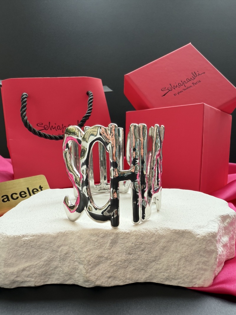 Браслет Schiaparelli с надписью