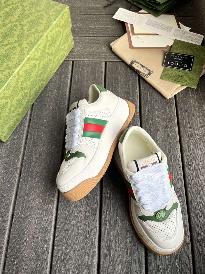 Кроссовки белые на массивной подошве с красно-зелеными деталями Gucci