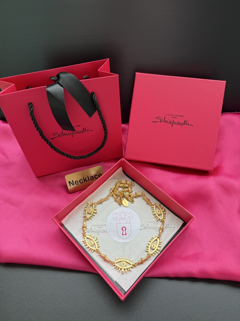 Золотистое колье с глазами Schiaparelli