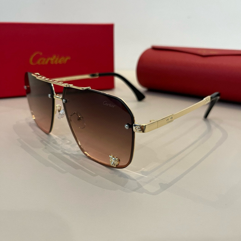 Солнцезащитные очки Cartier золотистые