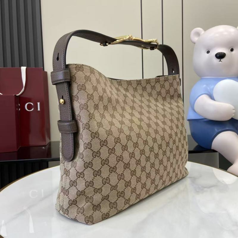 Сумка Gucci с монограммой и ручкой