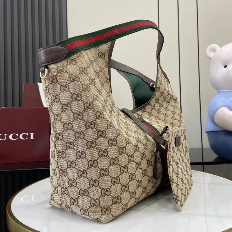 Сумка Gucci с монограммой и косметичкой
