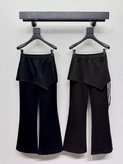 Чёрные брюки Saint Laurent с асимметричной юбкой