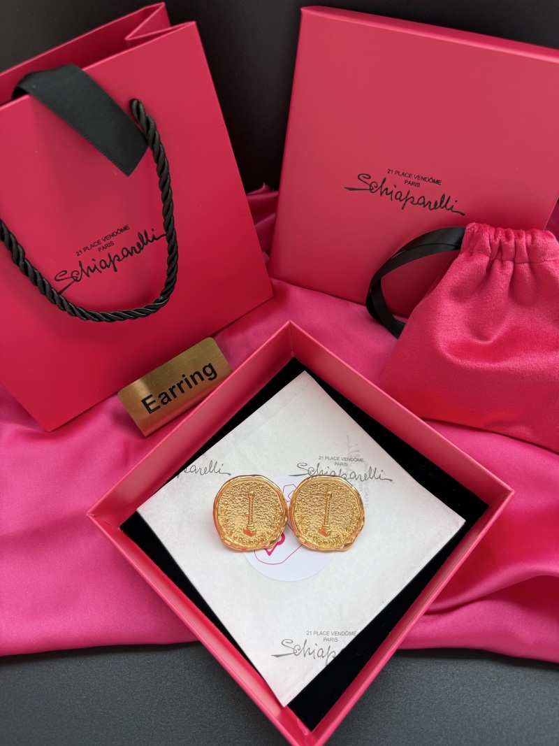 Серьги в форме монеты с изображением Эйфелевой башни Schiaparelli