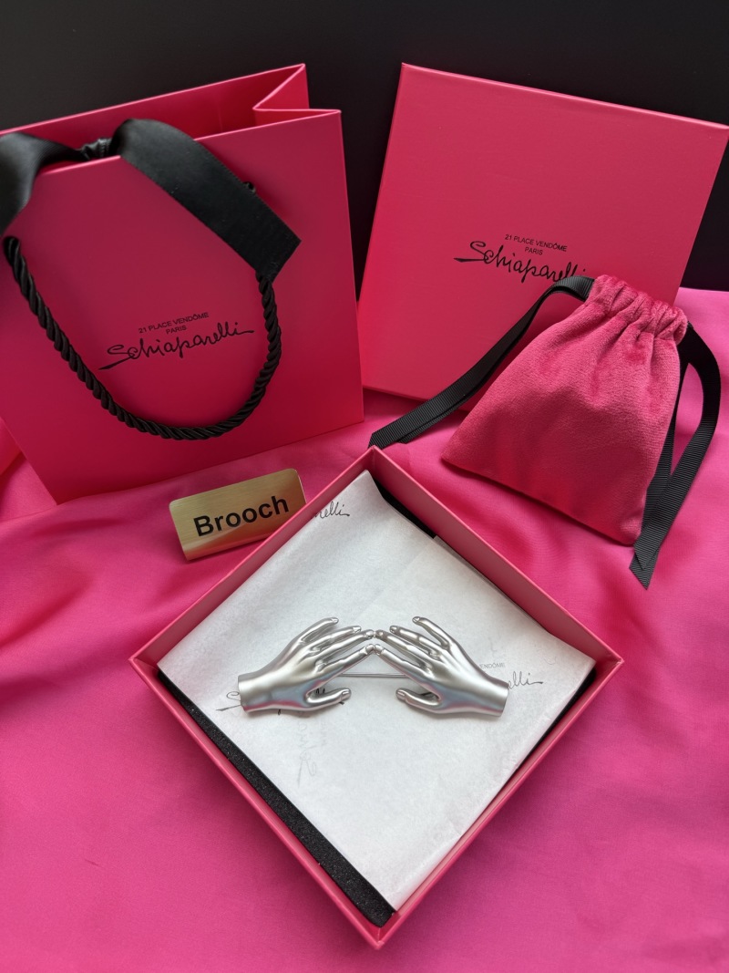 Брошь Schiaparelli