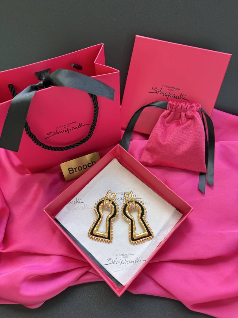 Серьги в форме ключа Schiaparelli