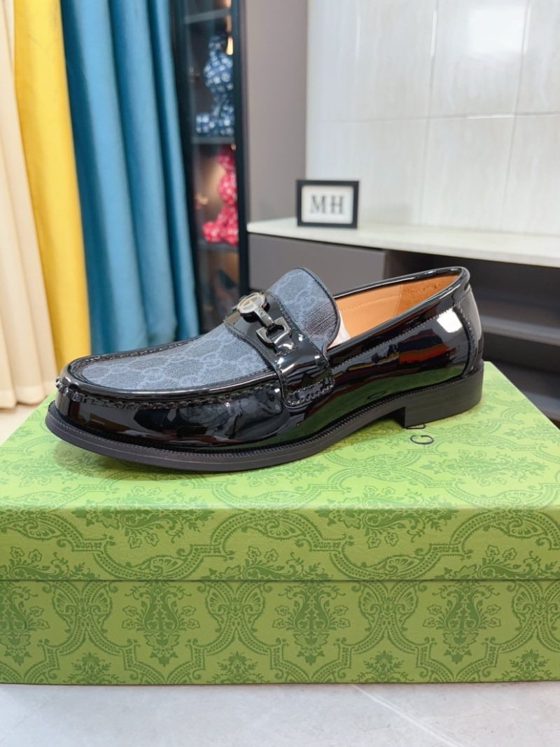 Мужские черные мокасины с декоративной пряжкой Gucci