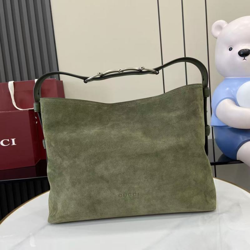 Сумка Gucci из замши с металлической ручкой