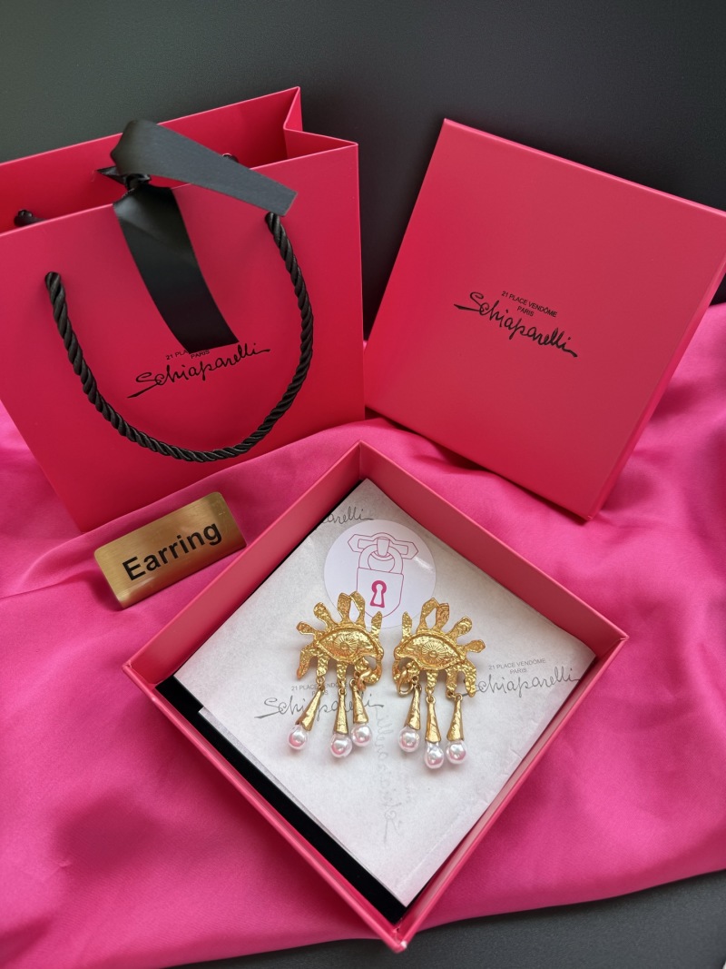 Серьги Schiaparelli в виде глаз с жемчугом