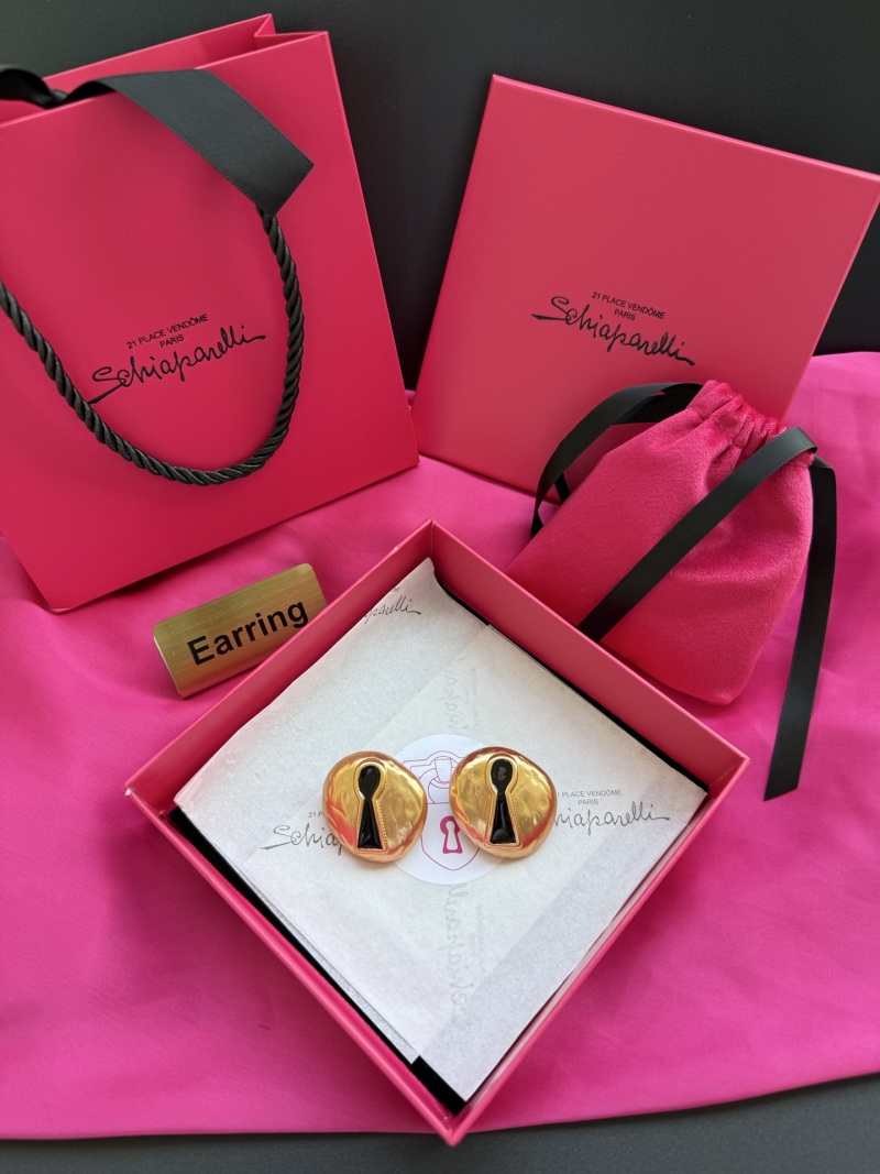 Серьги в форме ключа Schiaparelli