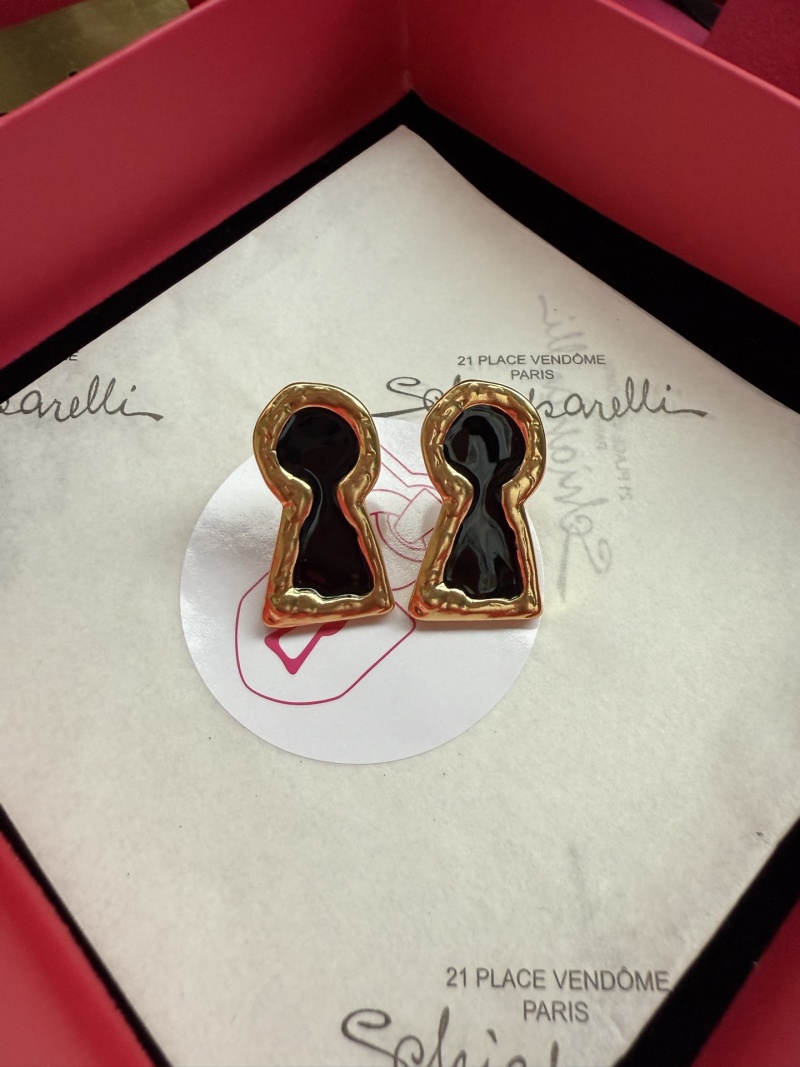 Серьги в форме ключевого отверстия Schiaparelli