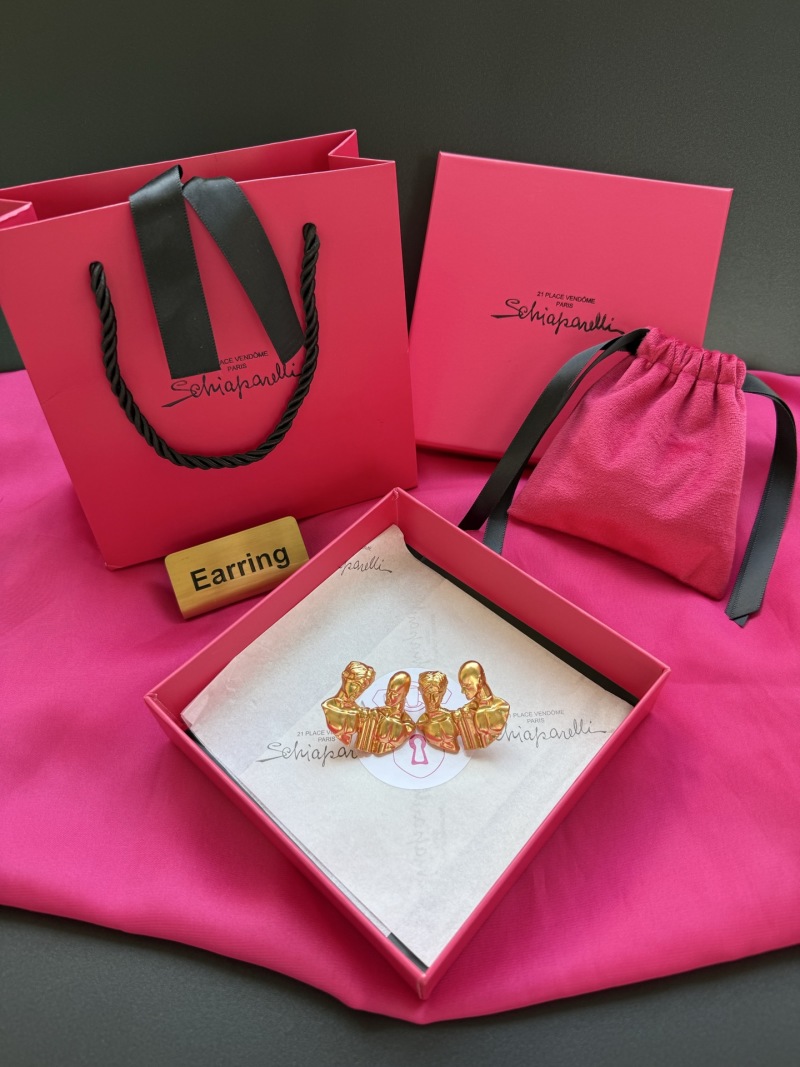 Серьги Schiaparelli в виде фигур