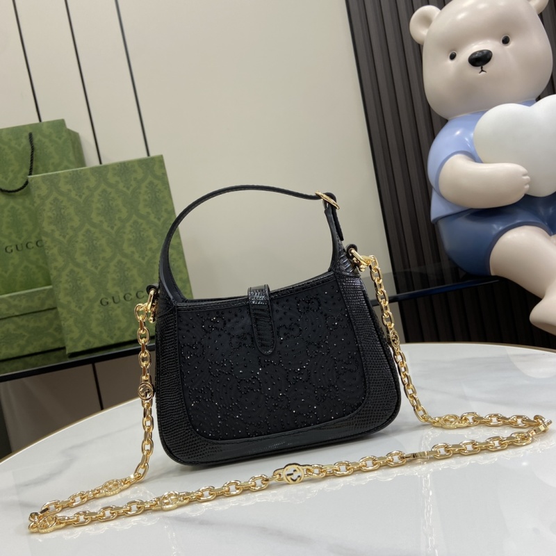 Черная сумка Gucci с золотой цепью