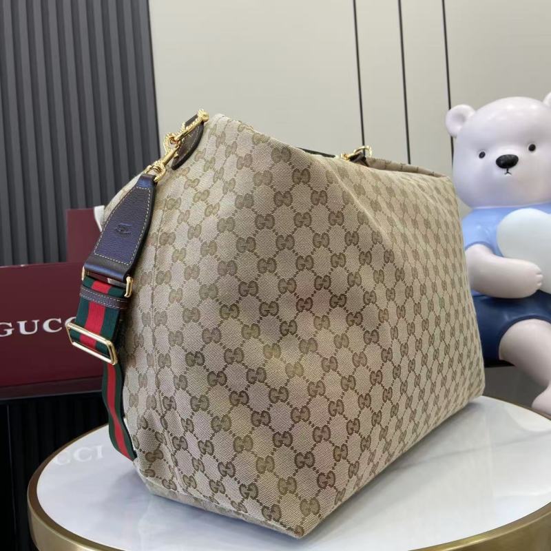 Сумка Gucci с монограммой и ручкой