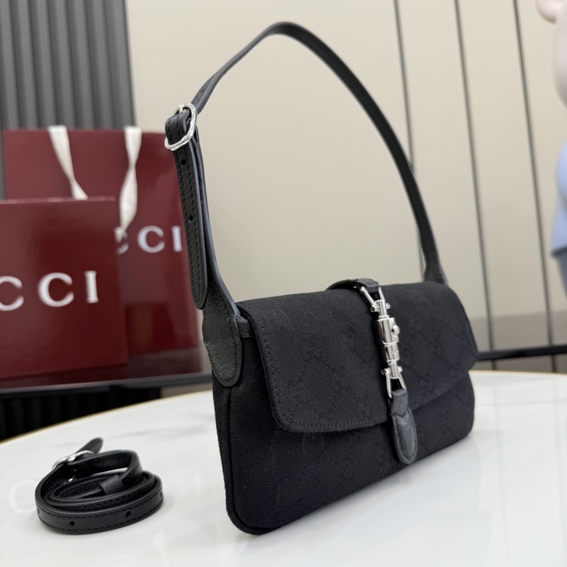 Черная сумка Gucci с монограммой