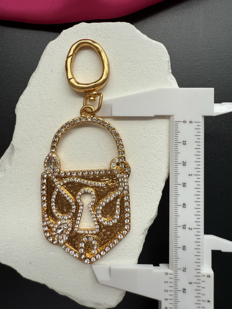 Подвеска Schiaparelli в виде замка
