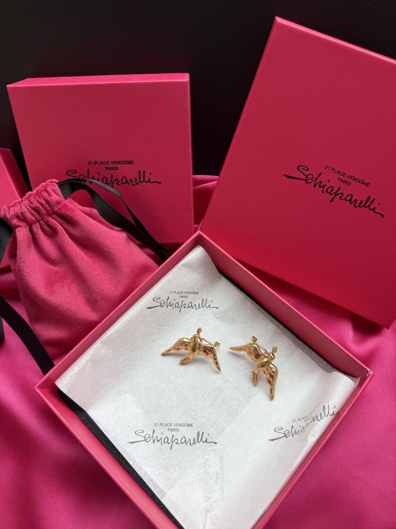 Серьги Schiaparelli в виде фигур
