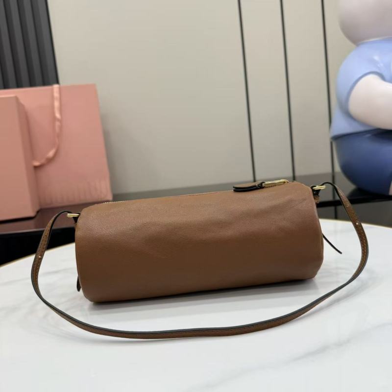 Сумка-цилиндр Miu Miu коричневый