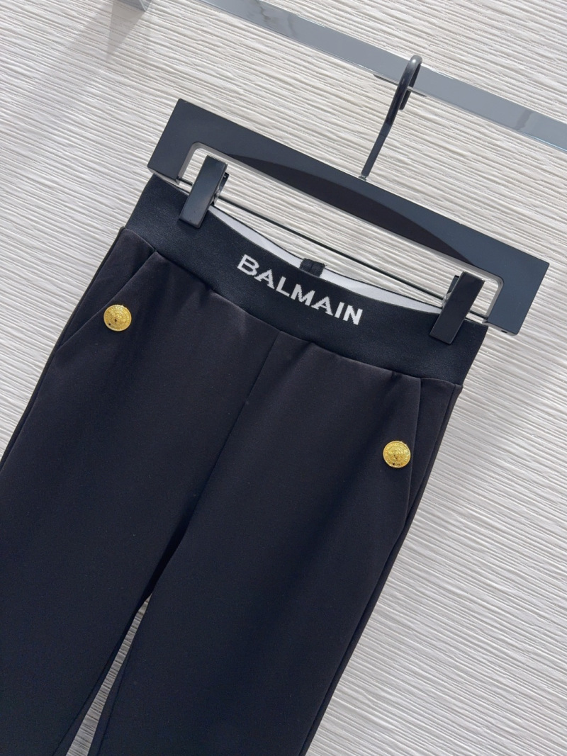 Женские черные брюки Balmain с золотистыми кнопками