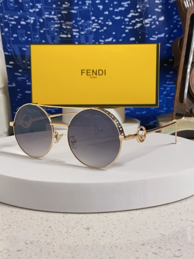 Солнцезащитные очки Fendi круглые золотые