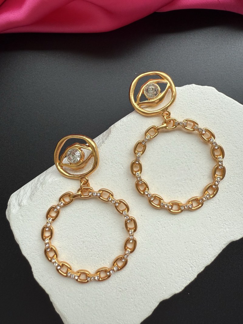 Серьги с глазом и цепочкой Schiaparelli