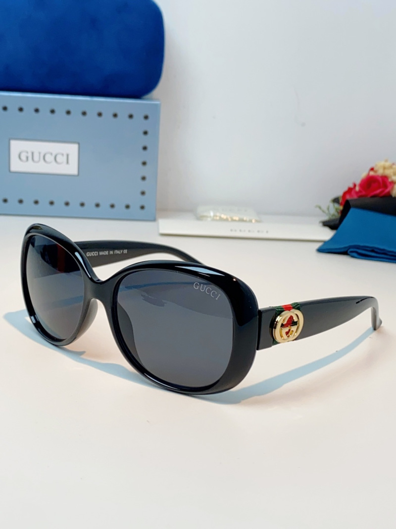 Крупные черные солнцезащитные очки Gucci с овальной оправой