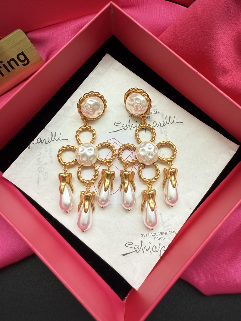 Серьги Schiaparelli с жемчугом и золотыми деталями