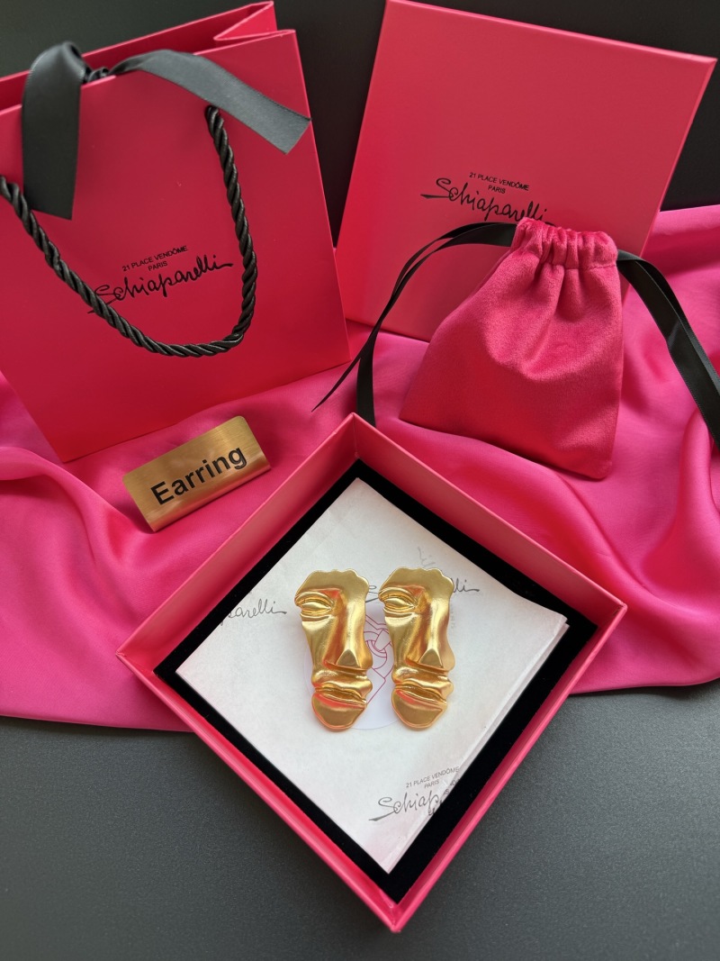 Золотистые серьги в виде абстрактных лиц Schiaparelli