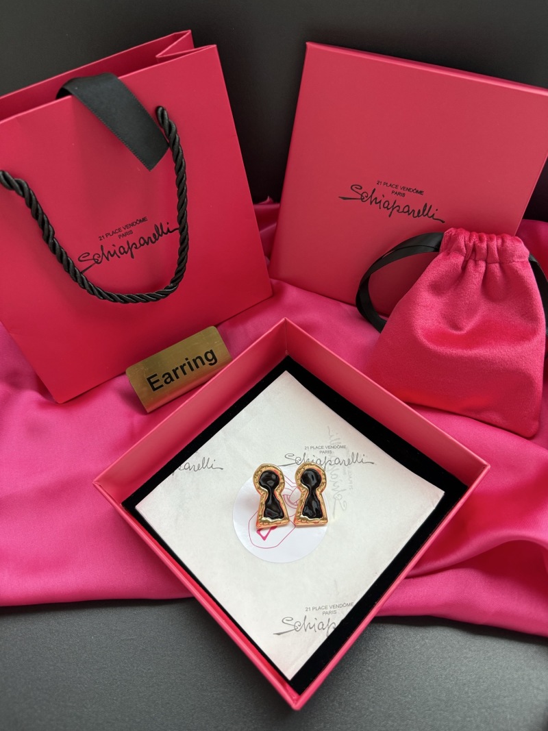 Серьги в форме ключевого отверстия Schiaparelli
