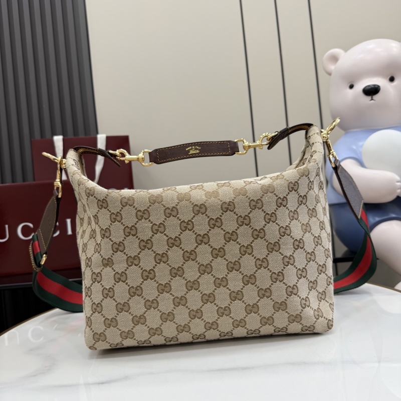 Сумка Gucci с канвой и кожаной ручкой