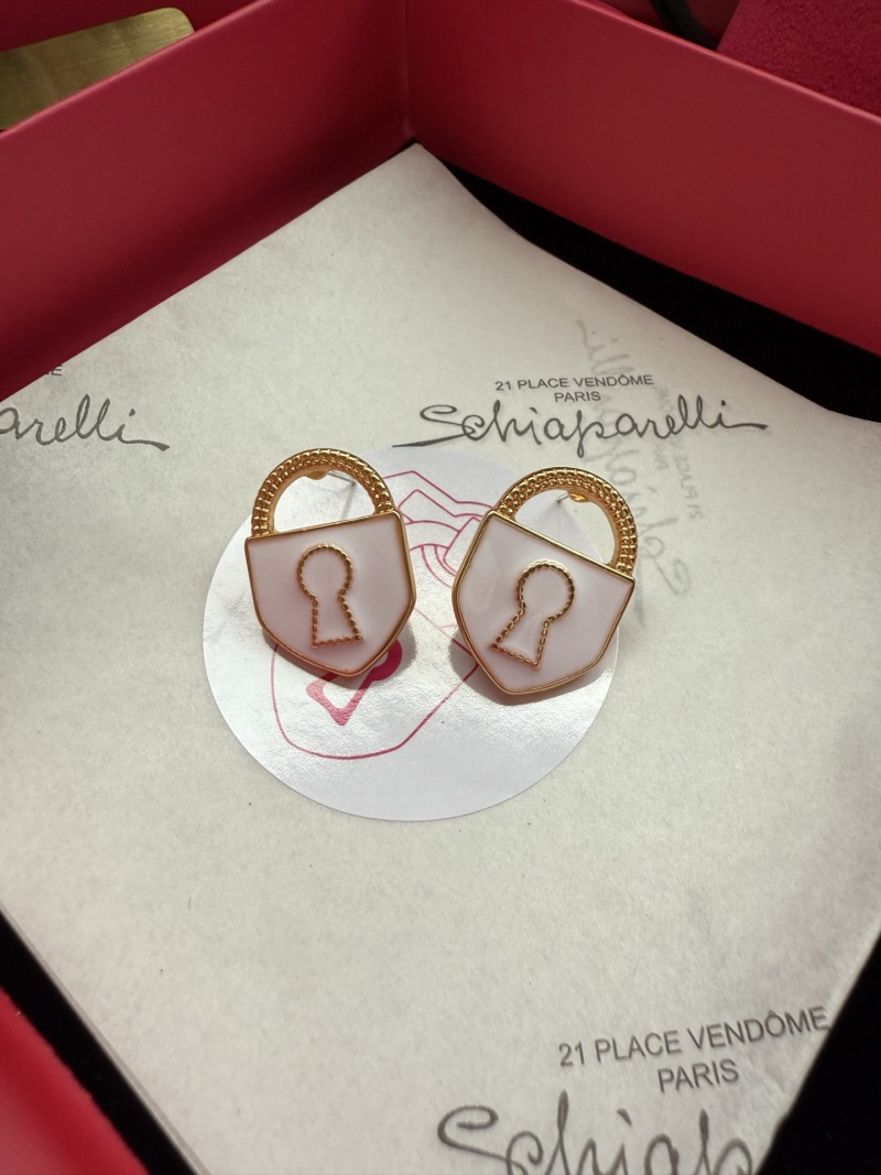 Серьги в форме замка Schiaparelli