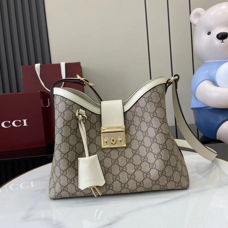 Сумка Gucci с замком и плечевым ремнем