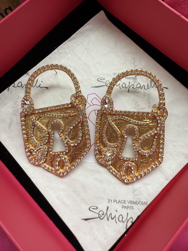 Серьги в виде замков с кристаллами Schiaparelli