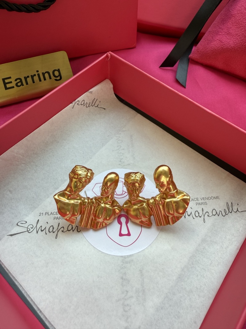 Серьги Schiaparelli в виде фигур