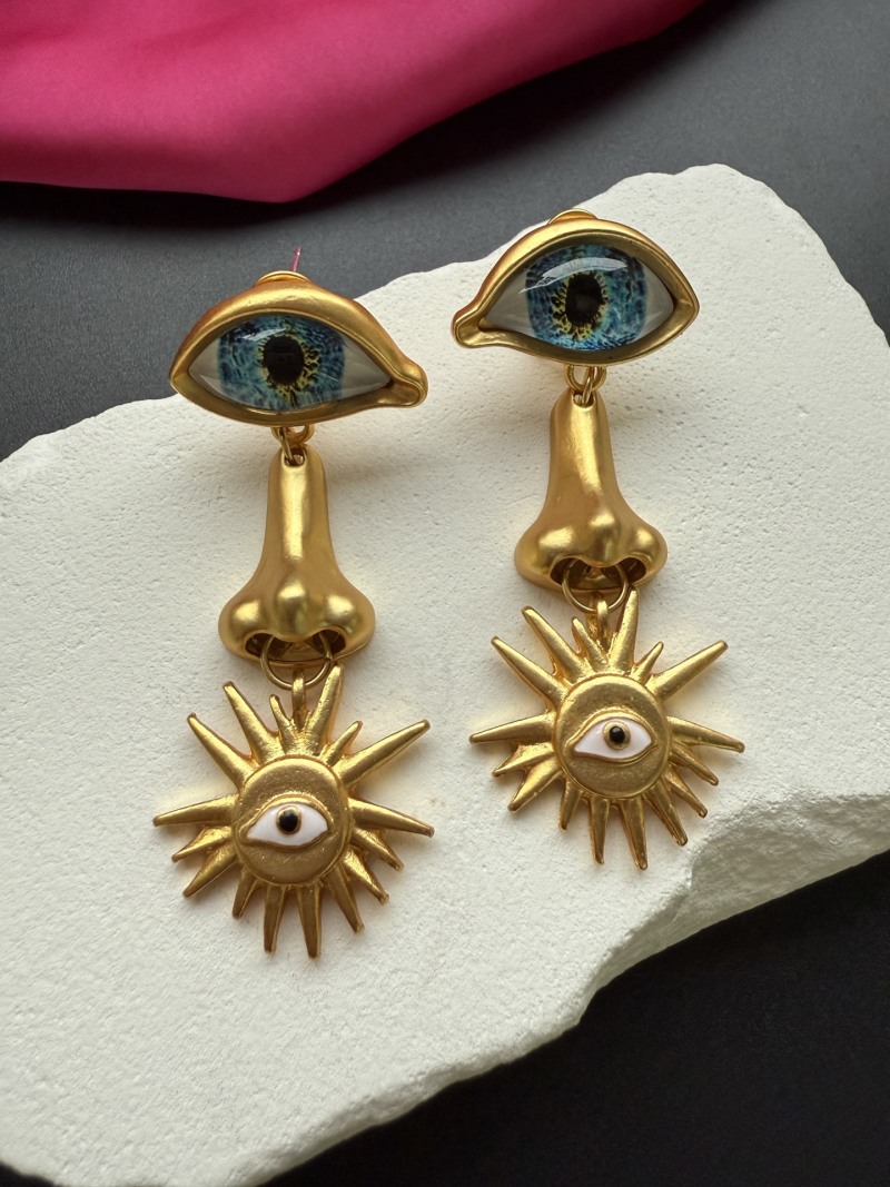 Серьги Schiaparelli с глазами и солнцем