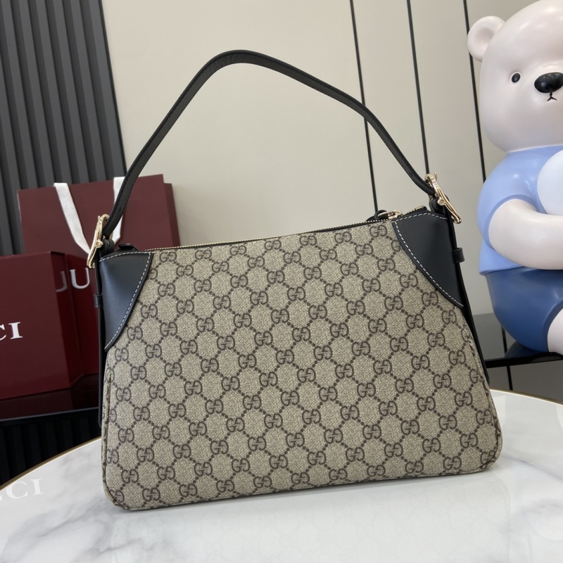 Сумка Gucci с монограммой и кожаными вставками