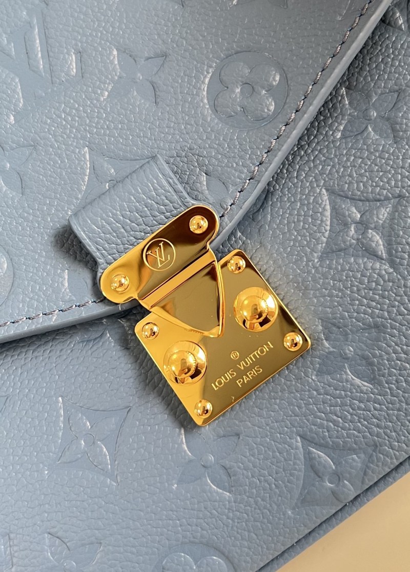 Сумка Pochette Métis Monogram Empreinte голубая Louis Vuitton