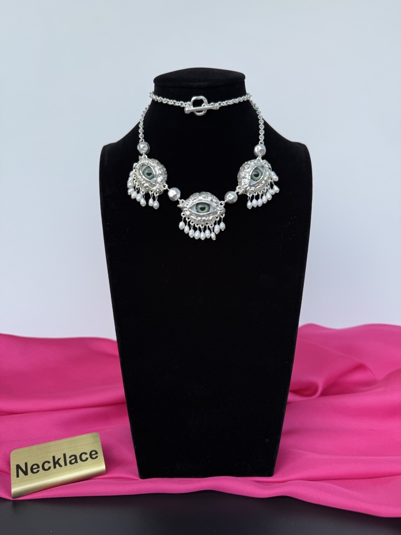 Колье с подвесками и бусинами Schiaparelli