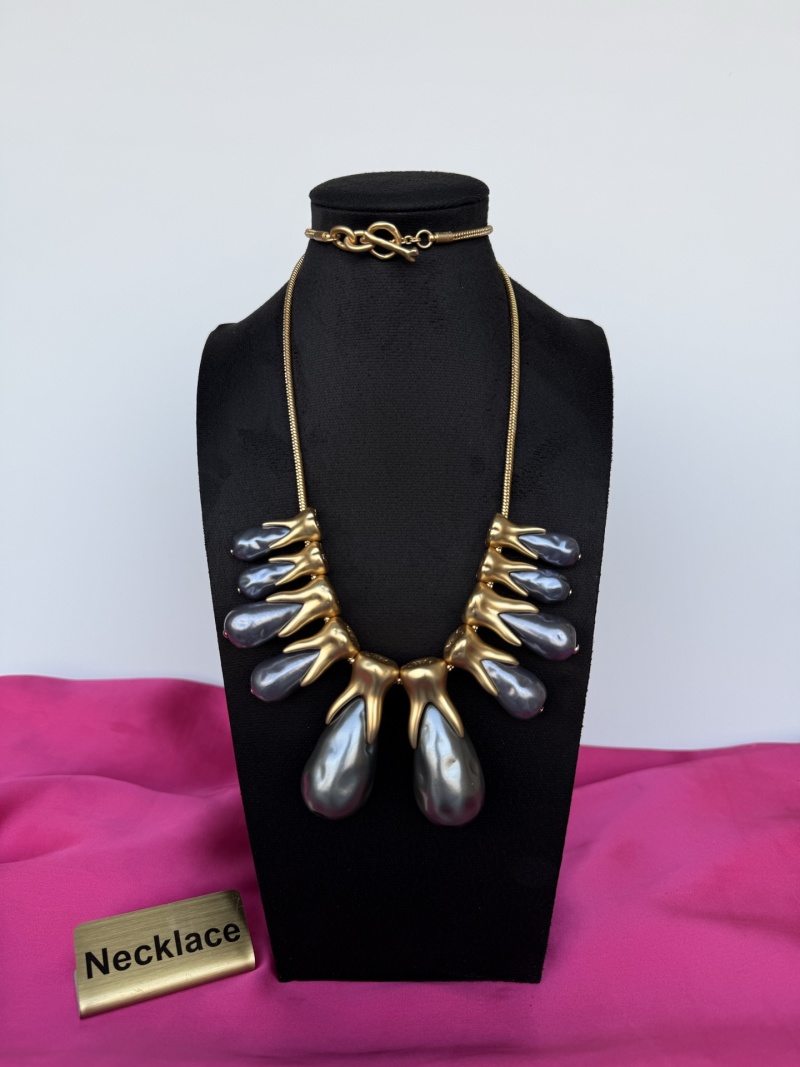 Набор из бусин и цепочки Schiaparelli