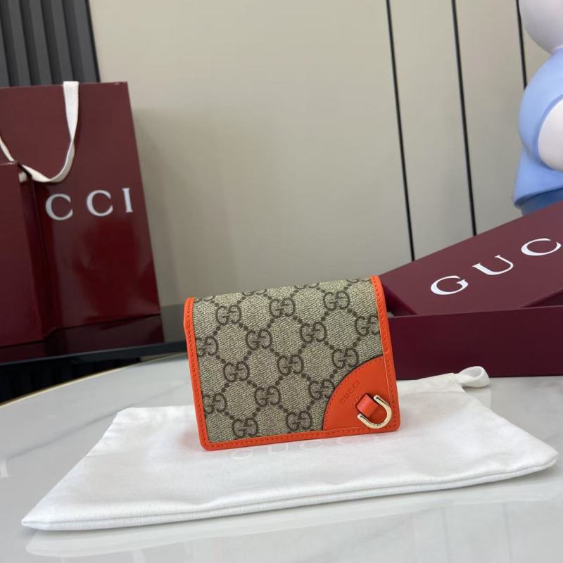 Портмоне Gucci с монограммой и оранжевой отделкой