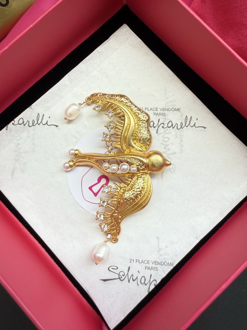 Брошь Schiaparelli в виде птицы