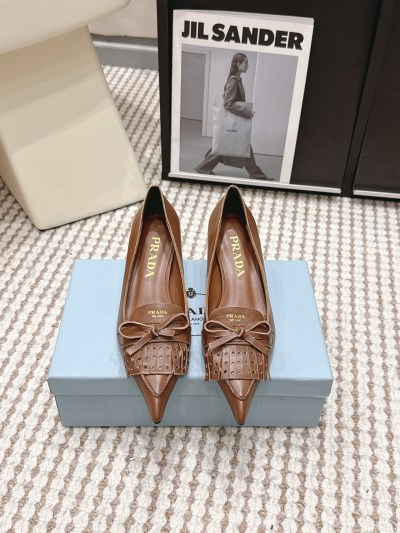 Туфли Prada с бантом и бахромой