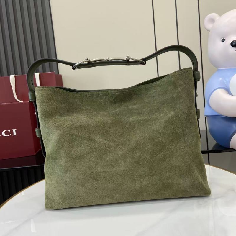 Сумка Gucci из замши с металлической ручкой