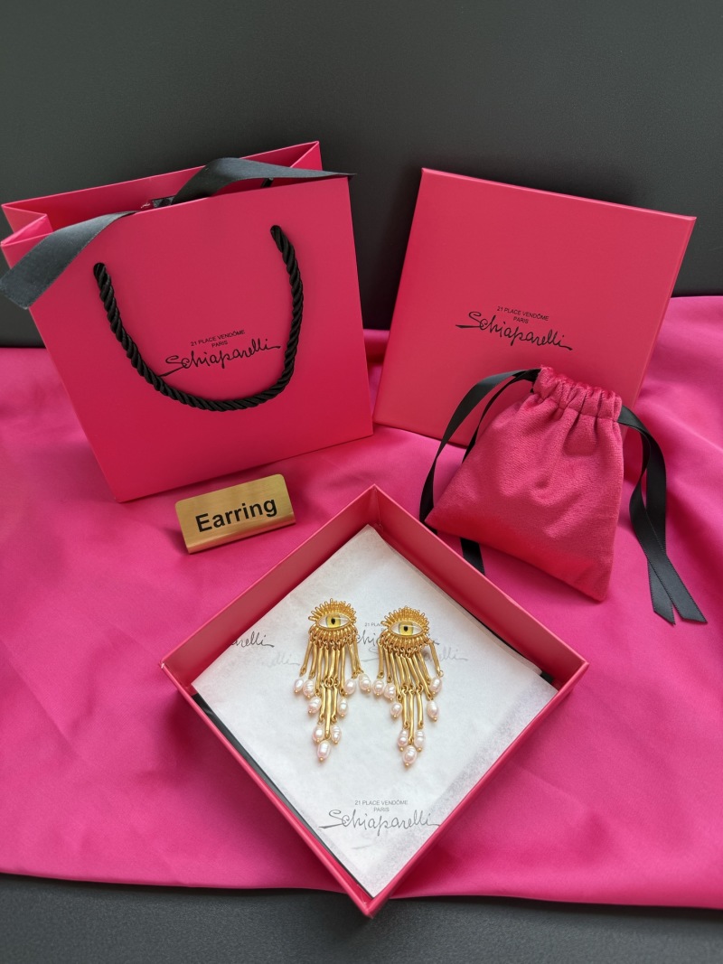 Серьги Schiaparelli с глазом и жемчугом