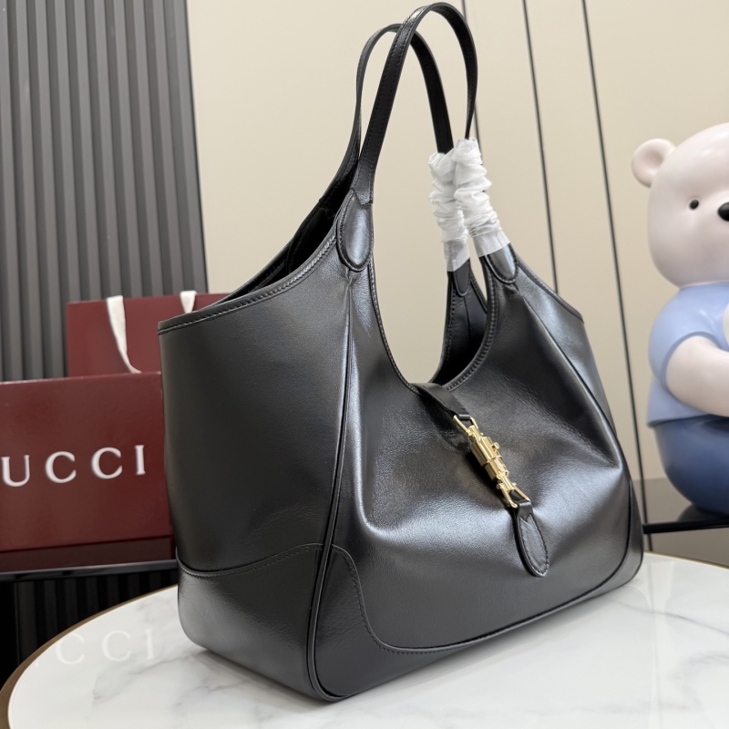 Черная кожаная сумка Gucci с замком