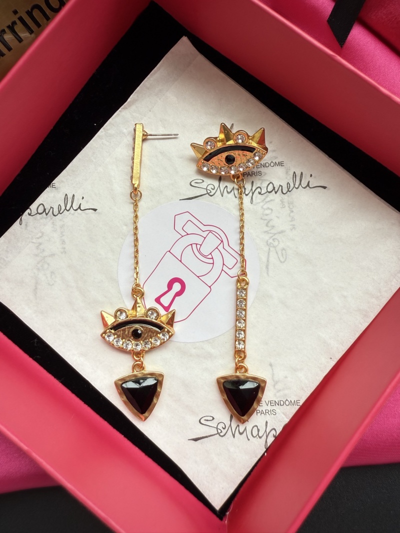 Серьги Schiaparelli с глазом и короной