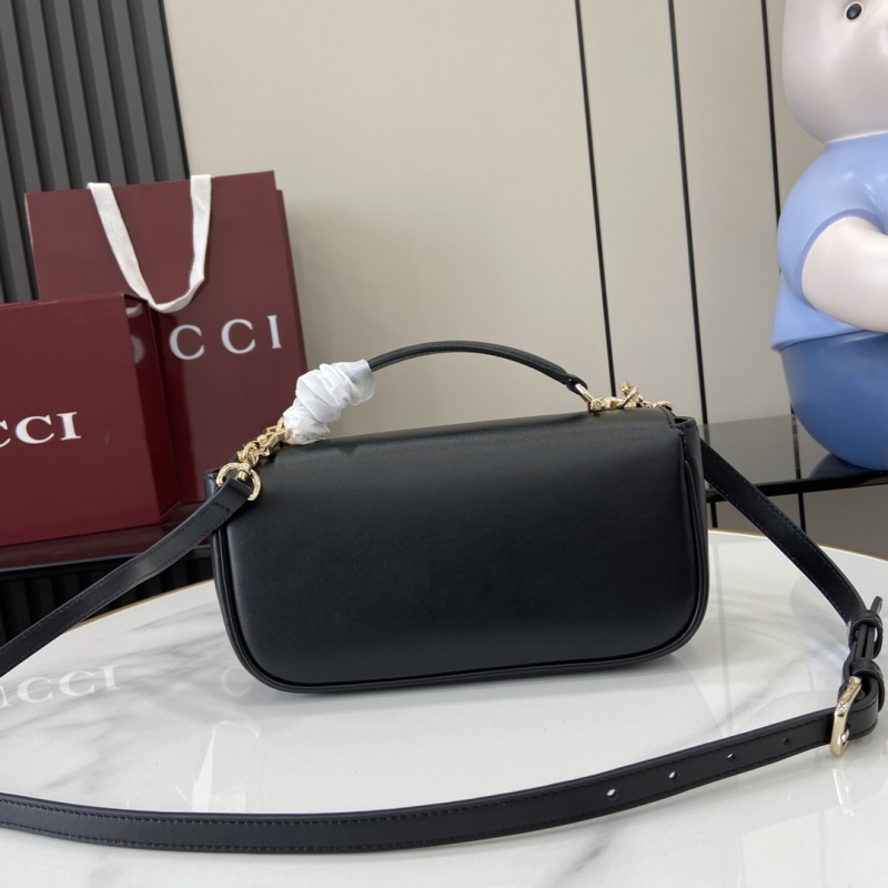 Черная сумка Gucci с золотой фурнитурой