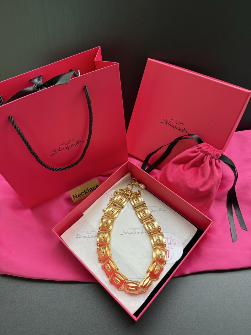 Золотистое колье с глазами Schiaparelli